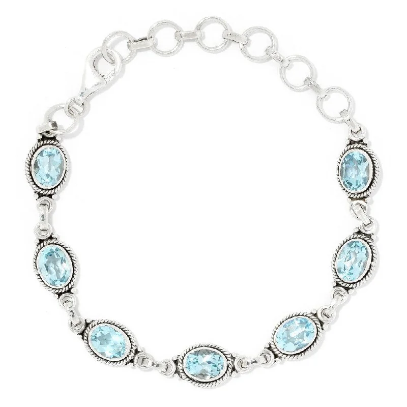 Women birthstone bangles and bracelets -Sterling Silver Oval Cut Blue Topaz Adjustable Line Bracelet