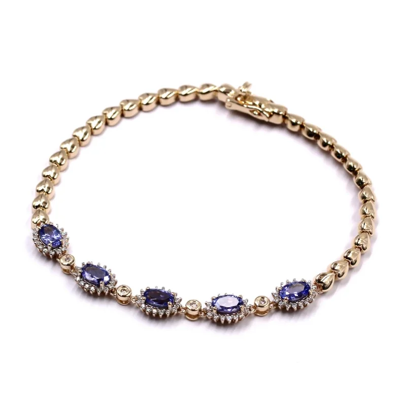 Women sleek gold bangles and bracelets -14Kt Yellow Gold Tanzanite and Diamond Chain Bracelet